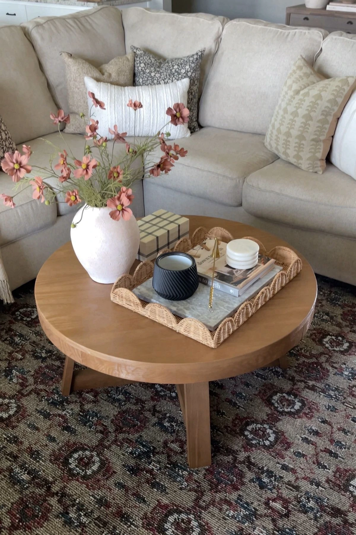 a round coffee table decorated with gift box