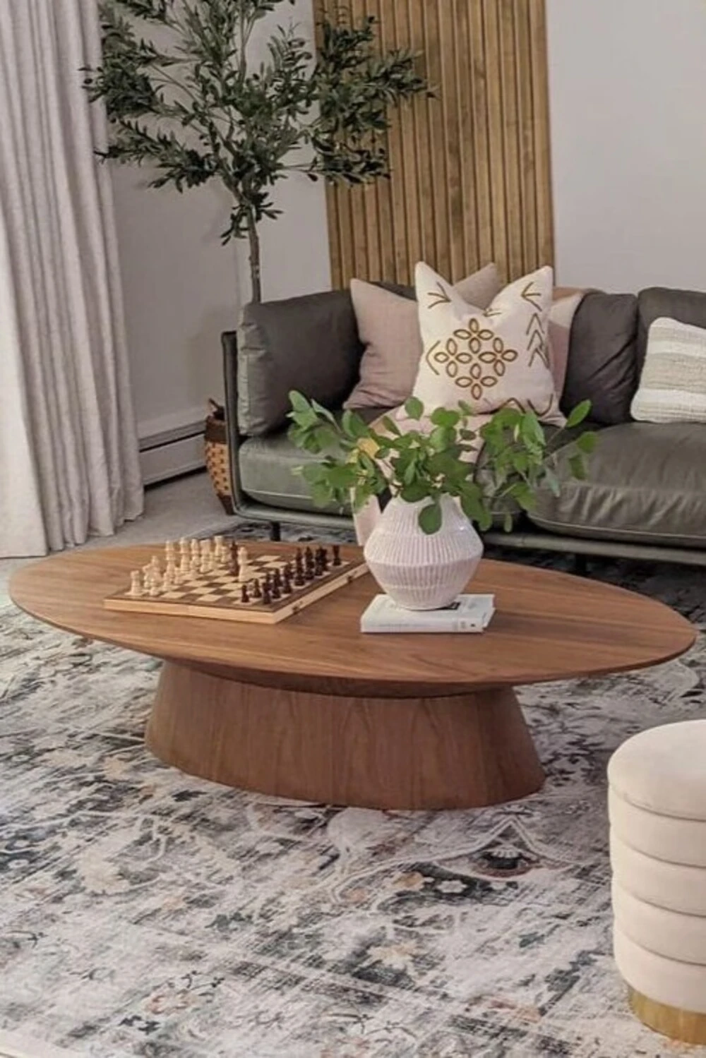an oval coffee table with chess board