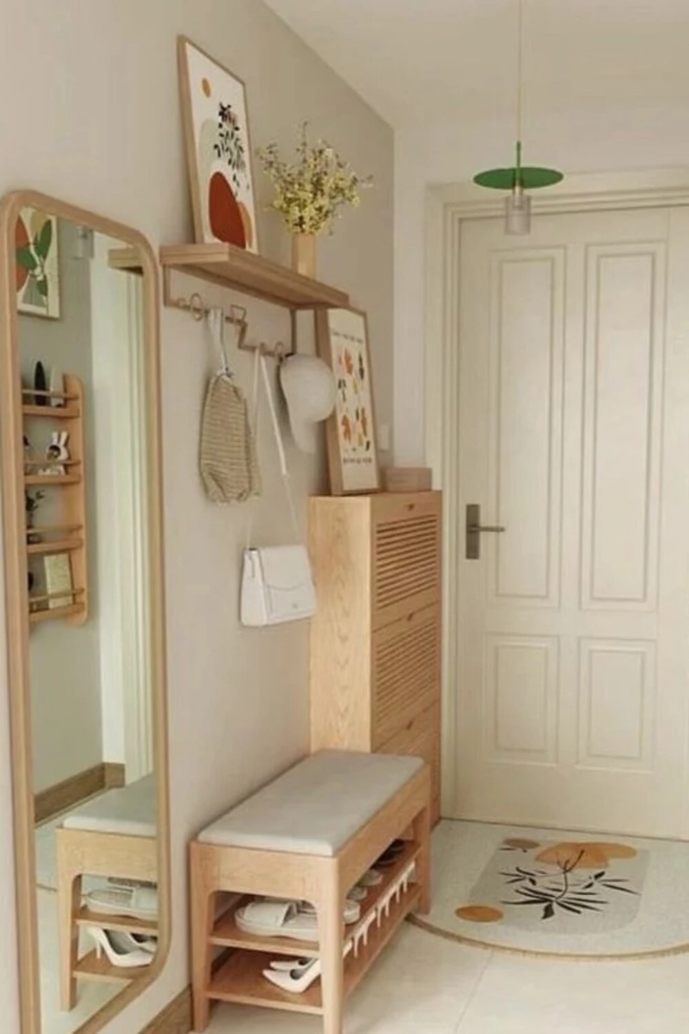 an apartment entryway with light color design