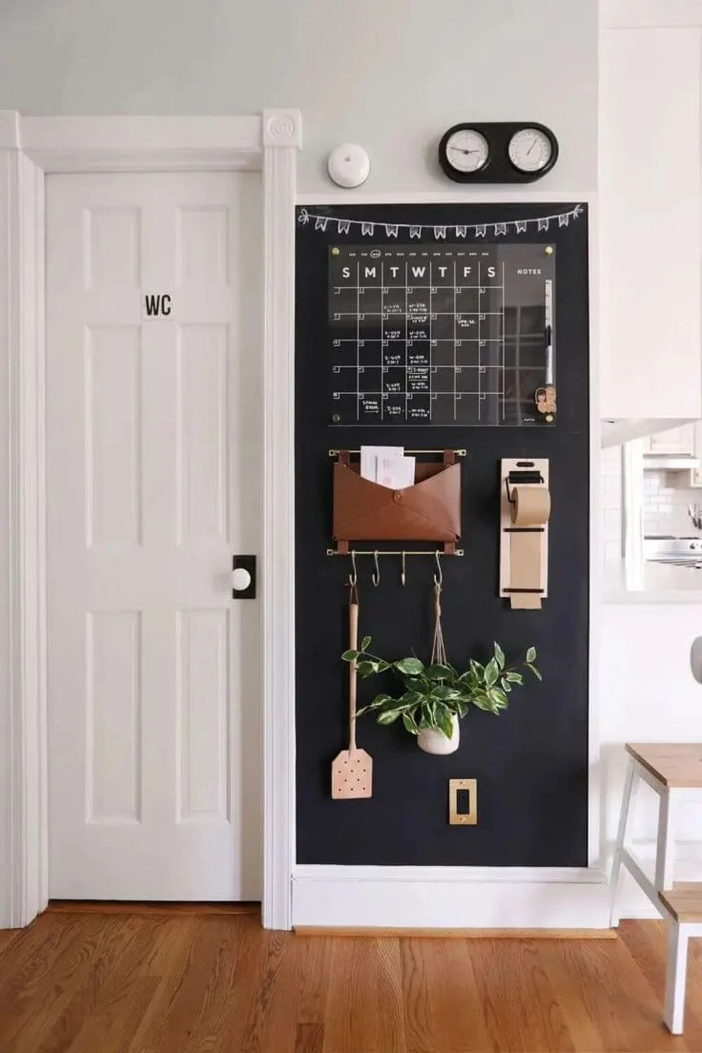 entryway wall with chalkboard
