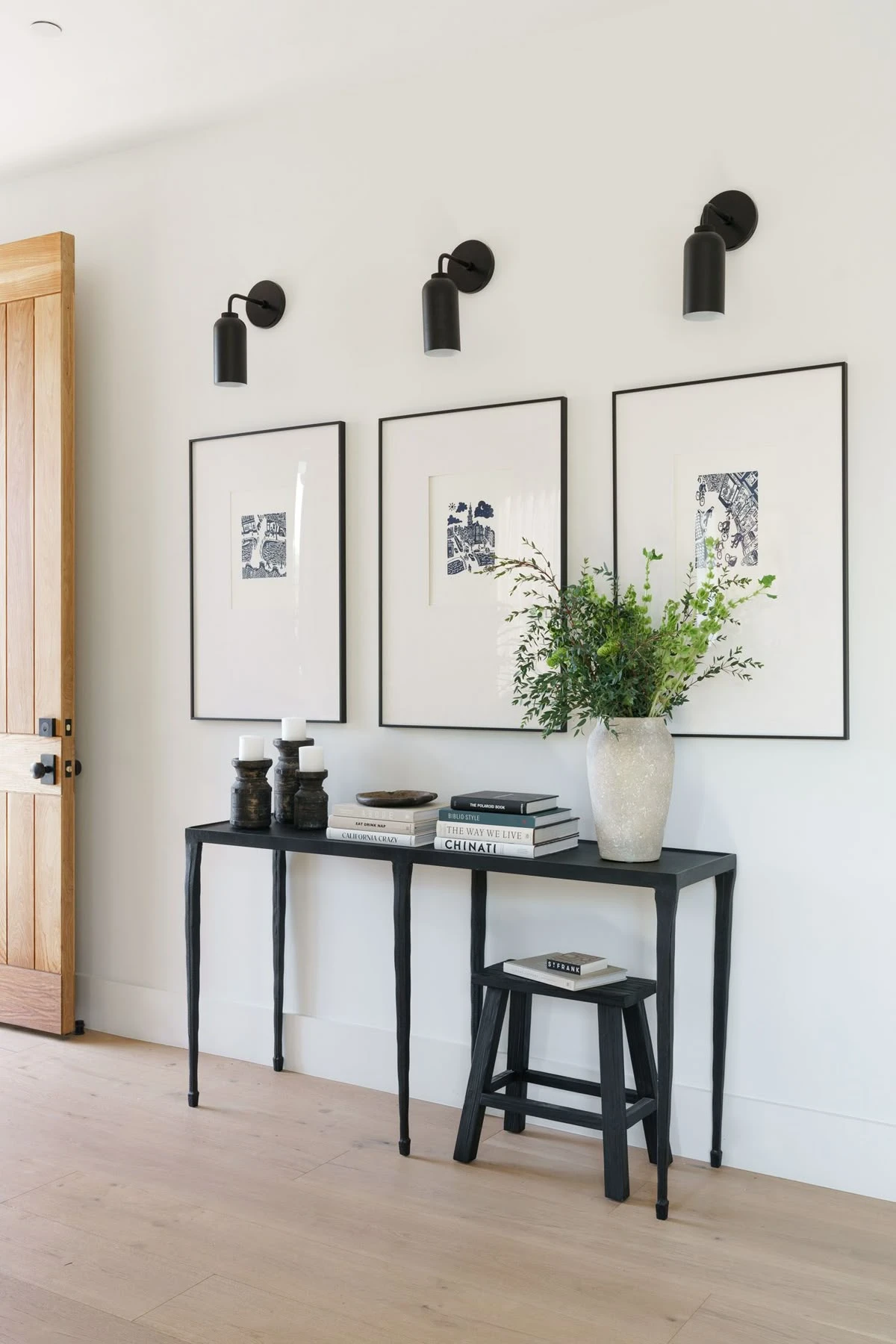 entryway wall with triple canvas