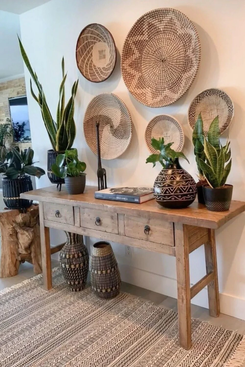 entryway wall with woven baskets