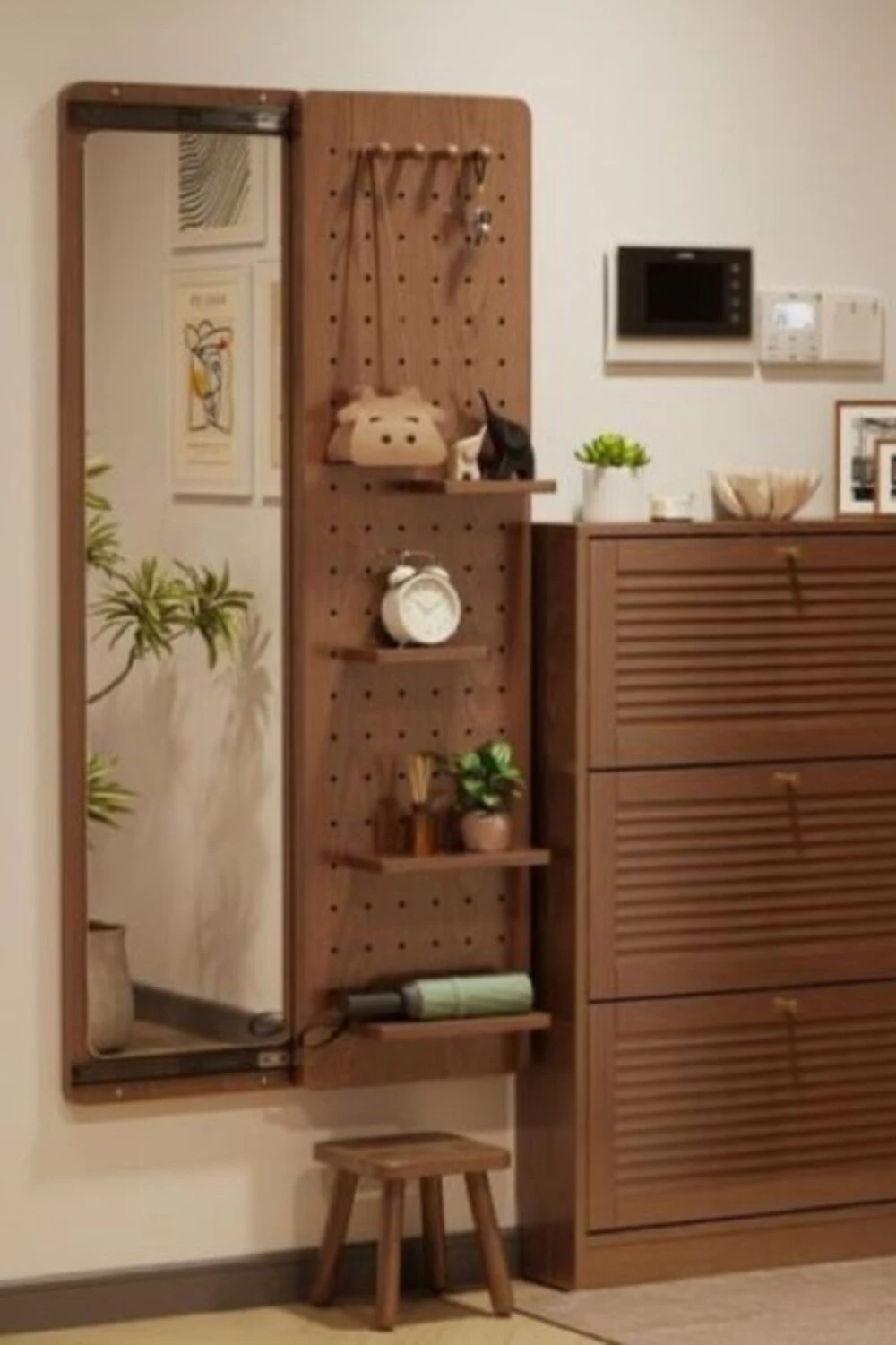 entryway with full length mirror and shelf